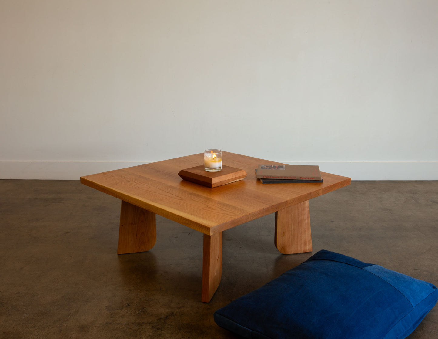 A full view of the hand-built Snyder DePass Temple Coffee Table, showcasing its clean, minimalist design and the rich grain of the solid wood.