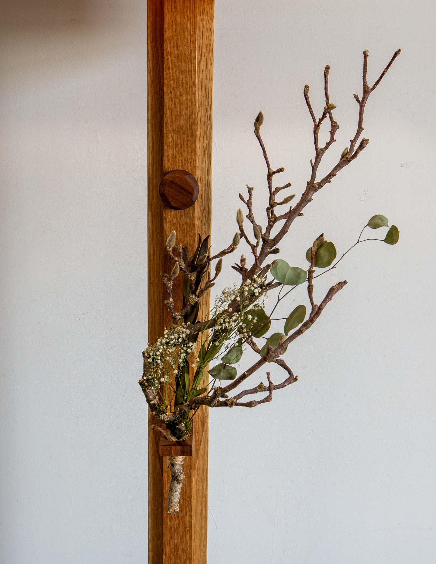 A close-up detail shot of the hand-built Snyder DePass Layered Floor Lamp, showing the careful arrangement and spacing of the individual wooden tiers that form the shade.