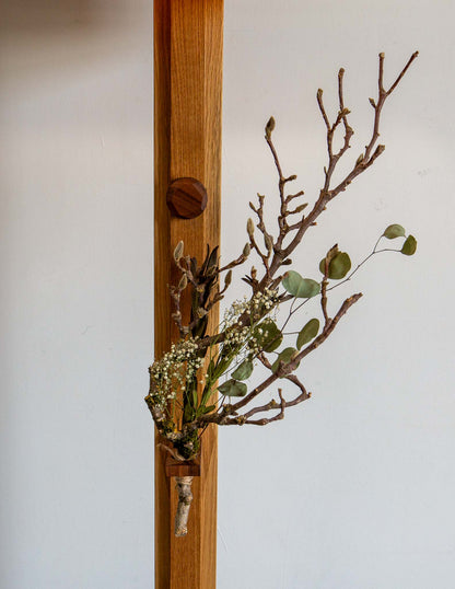 A close-up detail shot of the hand-built Snyder DePass Layered Floor Lamp, showing the careful arrangement and spacing of the individual wooden tiers that form the shade.